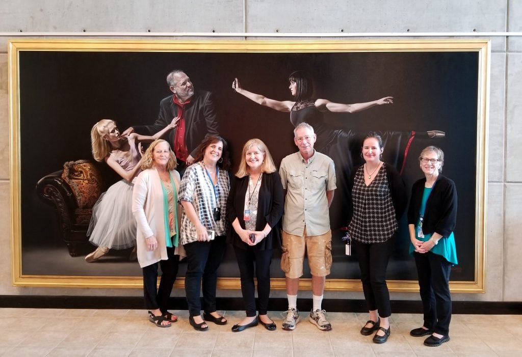 Kevin Grass's "Not #MeToo" painting with the LRMA staff