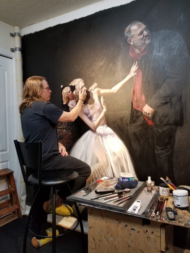 Florida artist Kevin Grass paints a ballerina in his Not #MeToo painting.