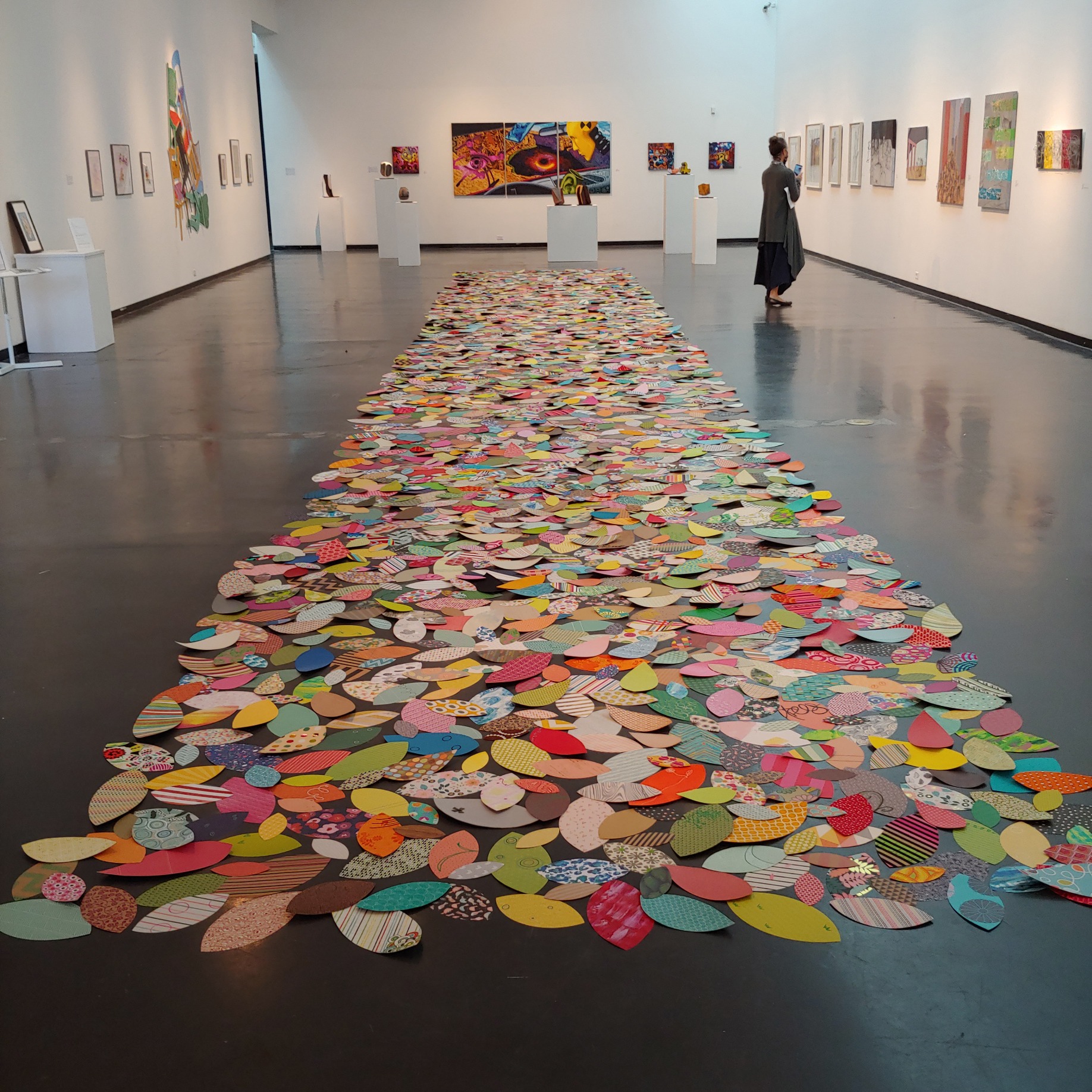 Steph Hargrove, “30 Minutes.” Dimensions: 8 ft x 54 ft. Fabric, paint, paper, collected chipboard waste.