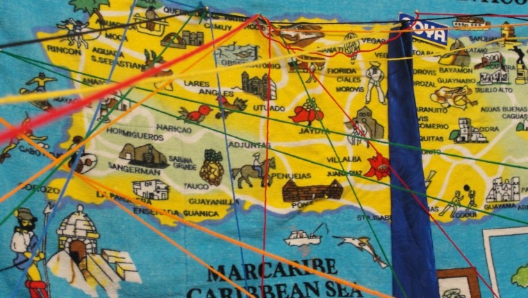 A map of Puerto Rico on a beach towel