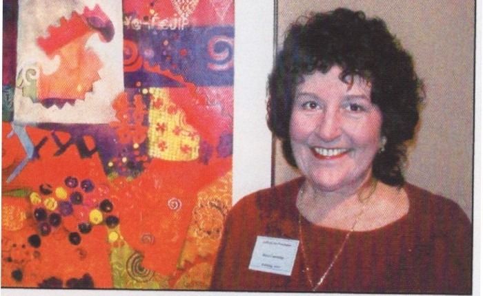 Marie Cummings with award winning painting "Kings Ransom."