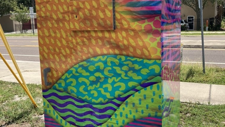 A signal box is decorated with patterns.