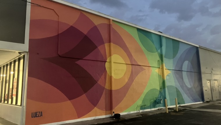 A colorful mural with abstract shapes.