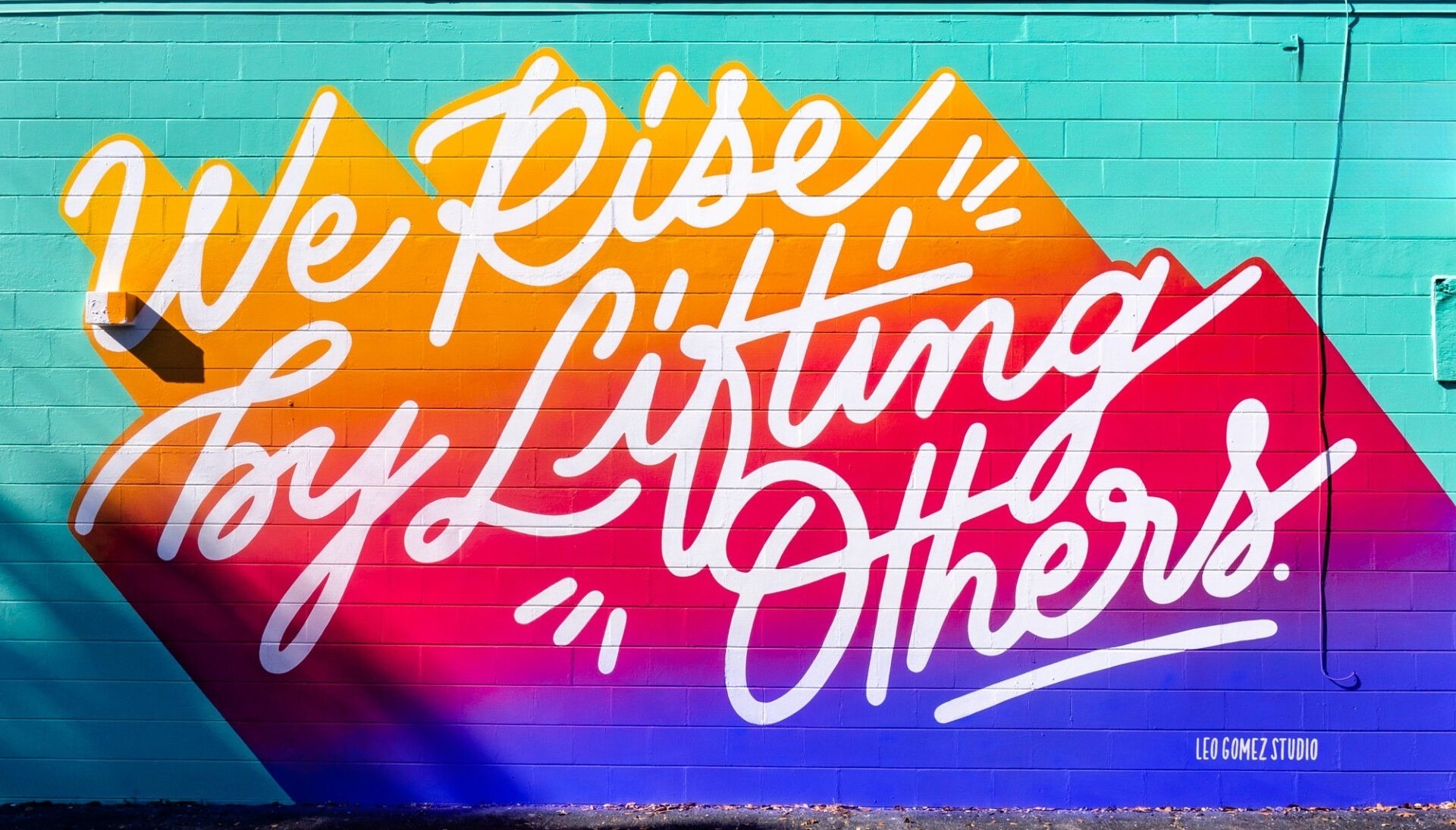 A colorful mural with text.