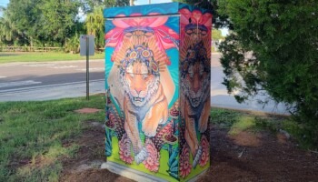 A signal box is decorated with a tiger.