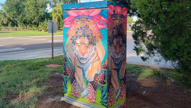 A signal box is decorated with a tiger.